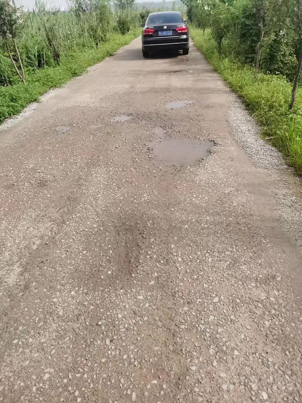 鄉(xiāng)村道路快速修補(bǔ)料施工現(xiàn)場 鄉(xiāng)村道路快速修補(bǔ)料施工現(xiàn)場